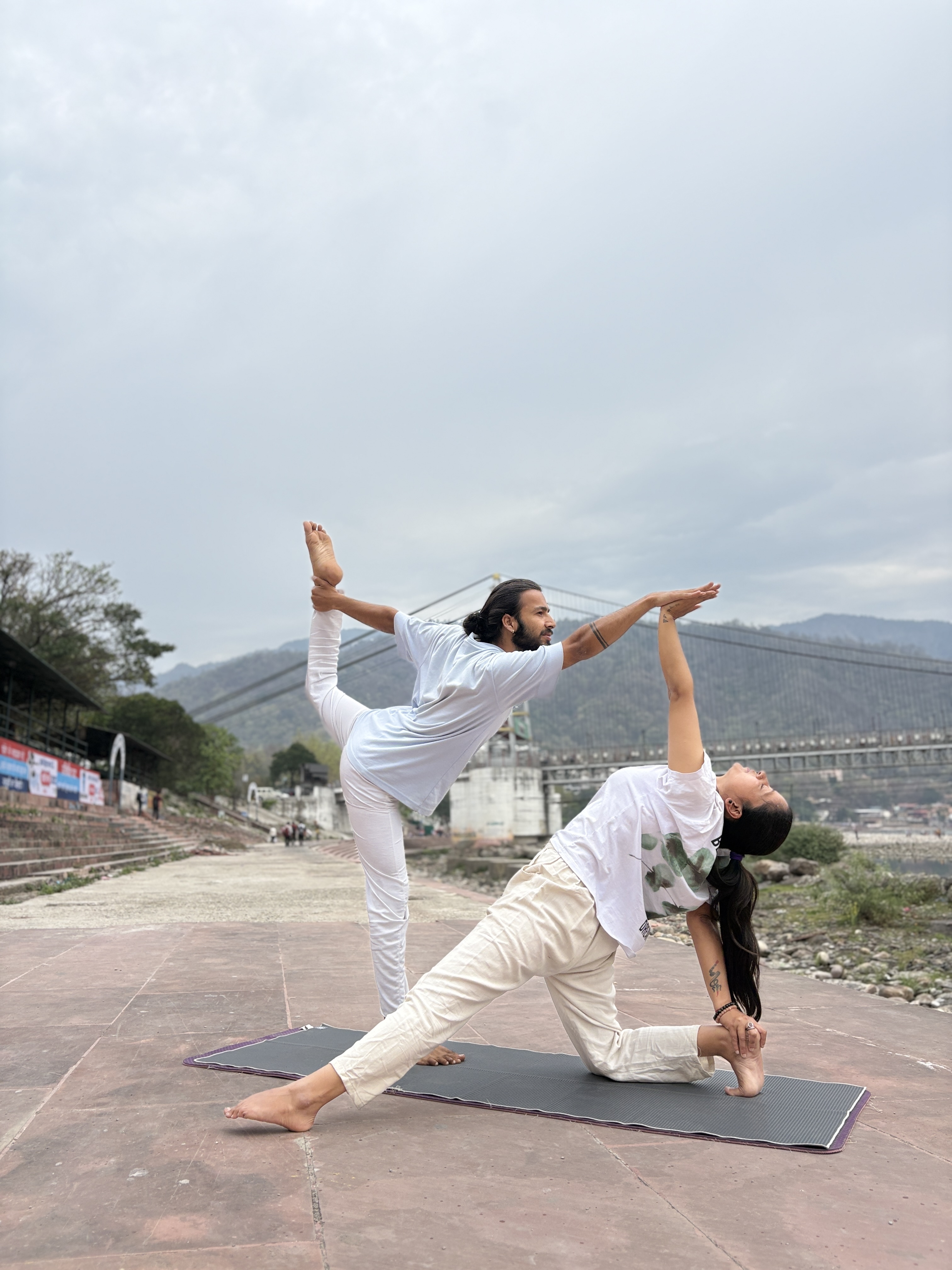 Students practising yoga at IYA