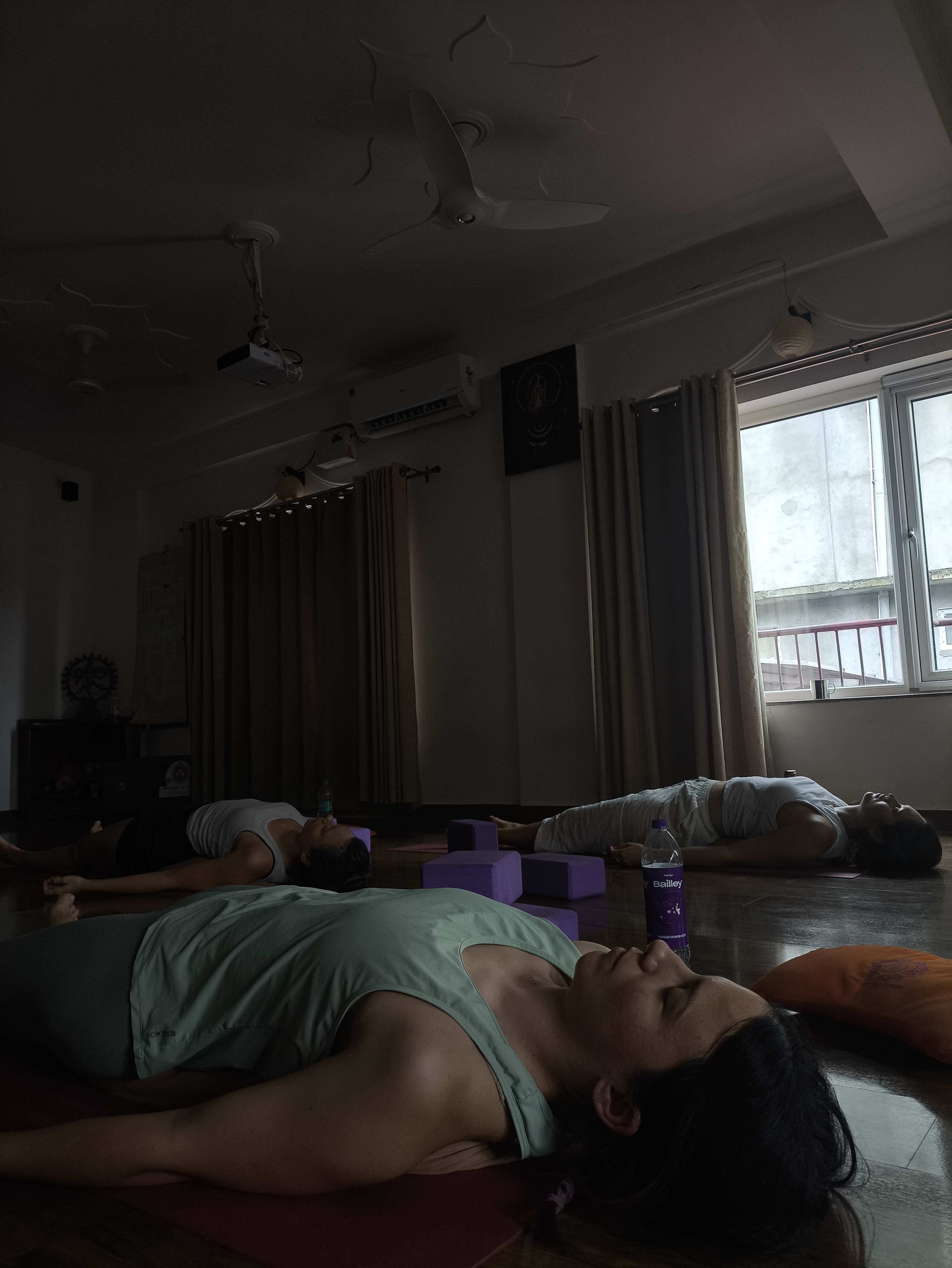 Students practising yoga at IYA Ashram